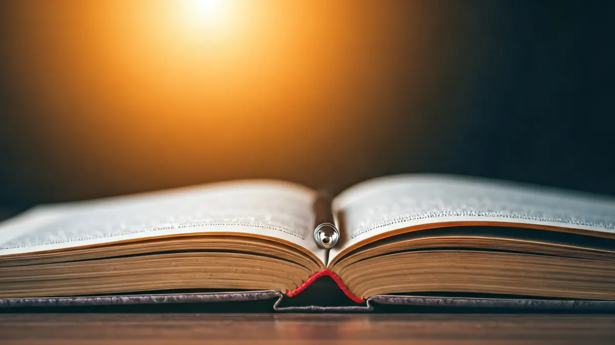 Generic image of an open book and a pen, symbolizing writing and poetry.