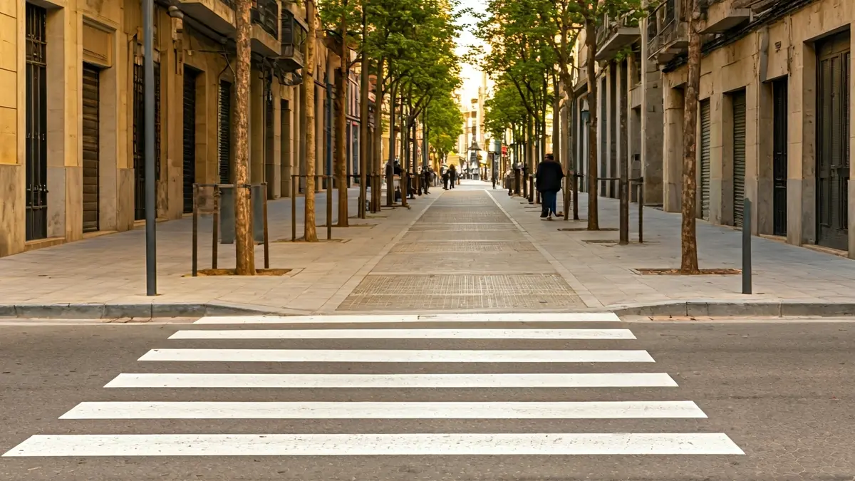 Generic image of a renovated sidewalk in a Spanish city, with accessibility features.