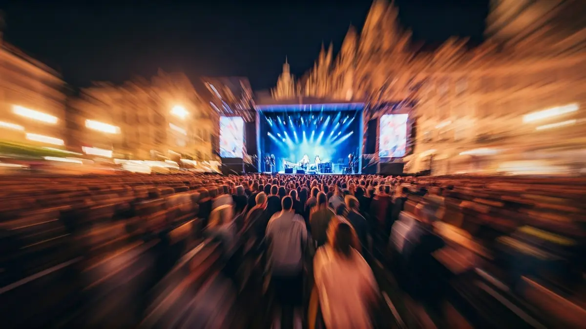 Generic image of an outdoor concert with a lively crowd.