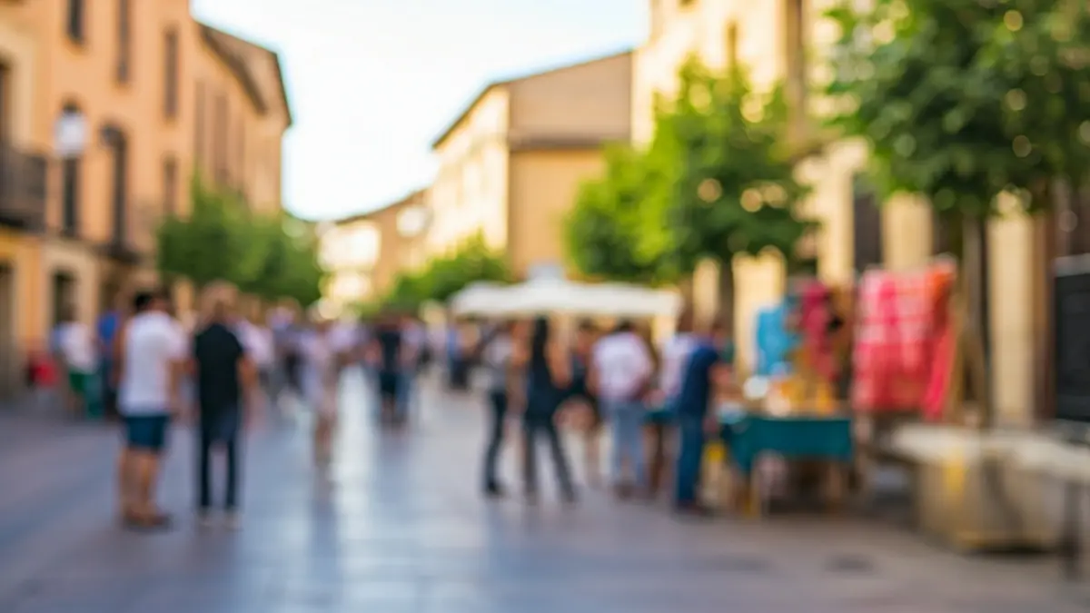 Imagen de actividades festivas en una plaza de Alcorcón, con juegos populares y pintacaras.