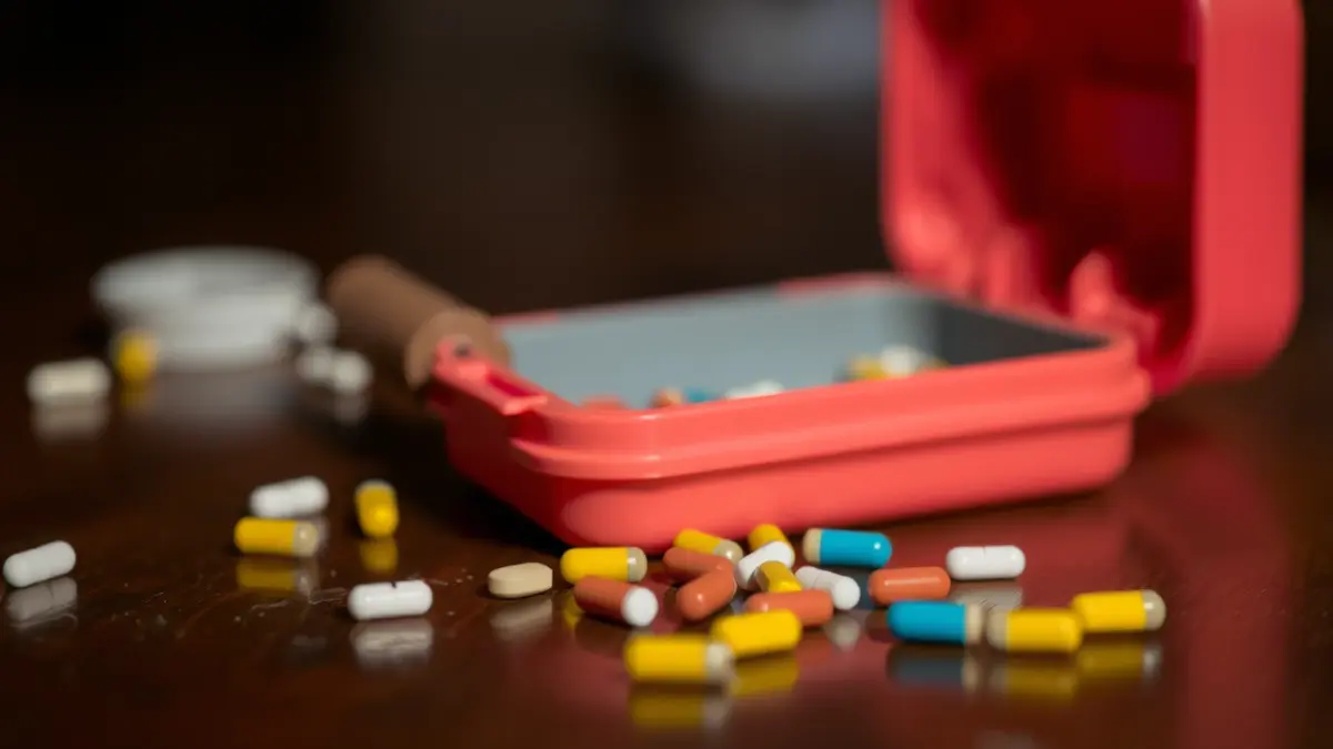 Image of a toy and pills, representing the discovery of camouflaged drugs.