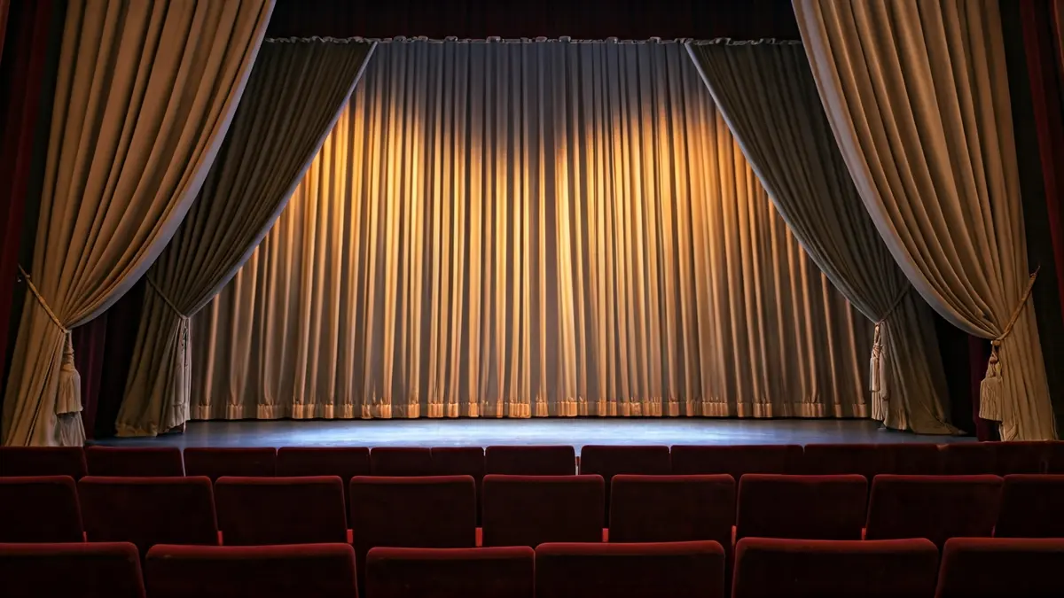 Generic image of a theater stage with curtains and lights, evoking a dance performance.