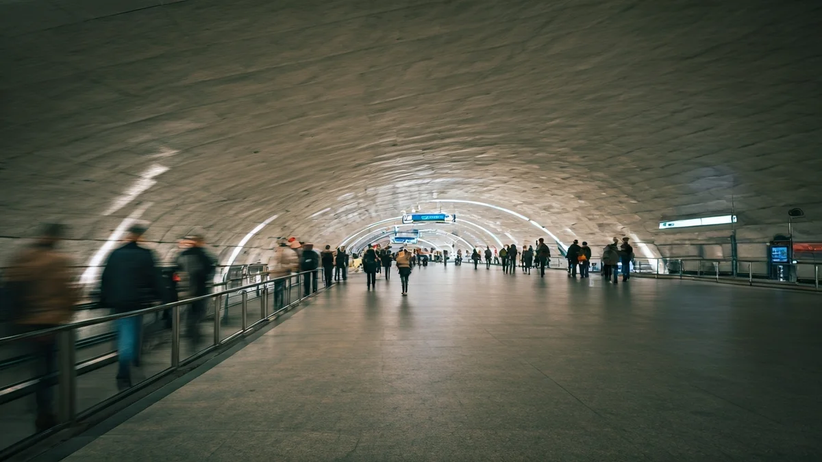 Generic image of a modern metro station access with a circular ramp.