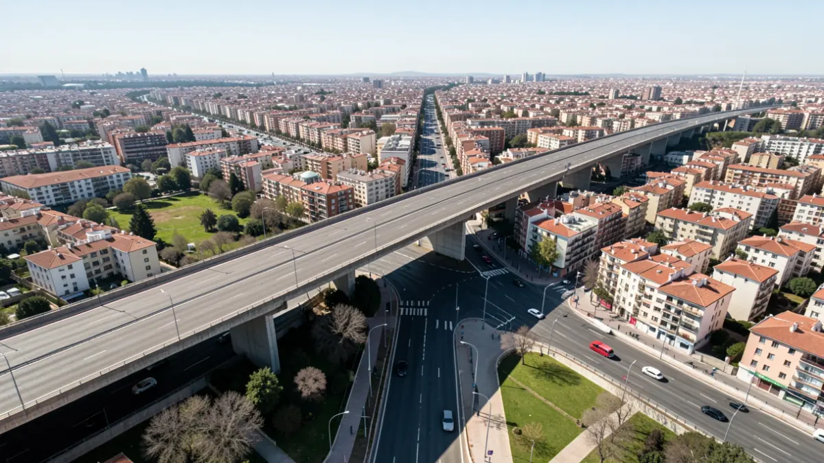 Aerial view of the 'Scalextric' overpass in Puente de Vallecas, Madrid, a large infrastructure dividing the neighborhood.