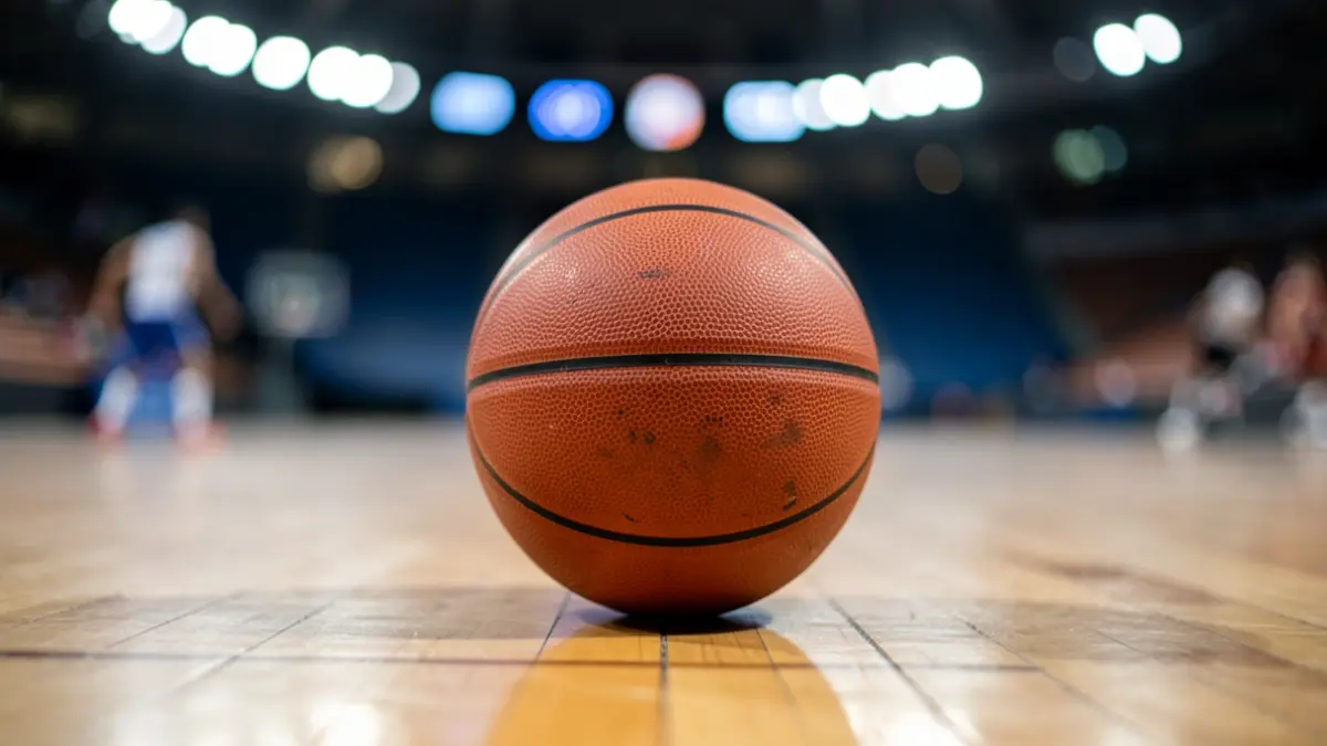Generic image of a basketball on a court.