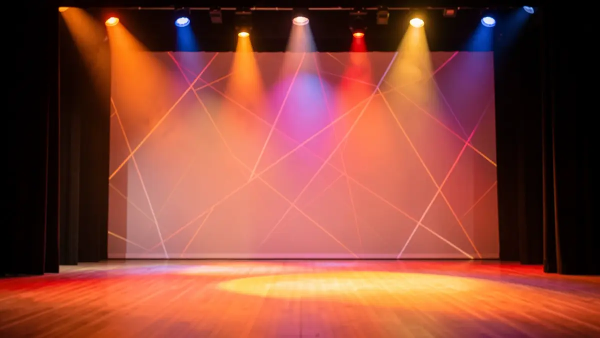 Generic image of a contemporary dance stage with abstract lighting.