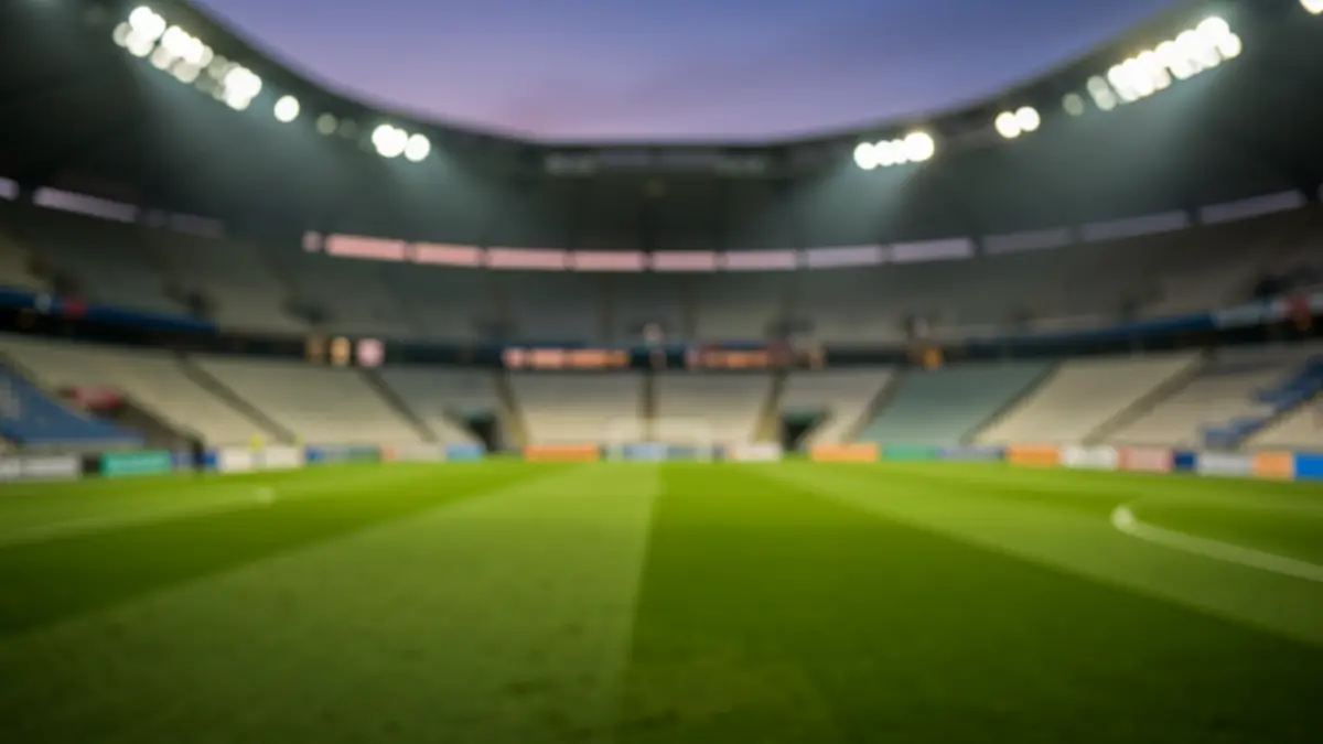 Generic image of an empty football stadium at dusk.