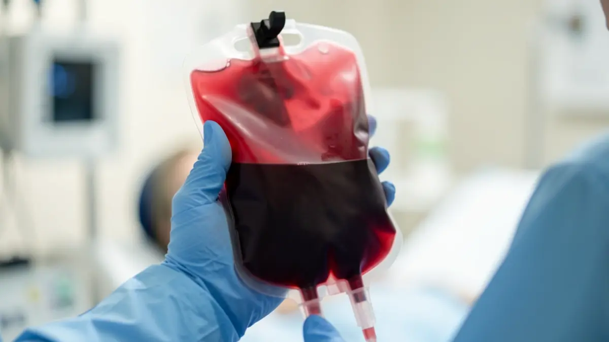 Generic image of a blood bag being donated in a medical setting.