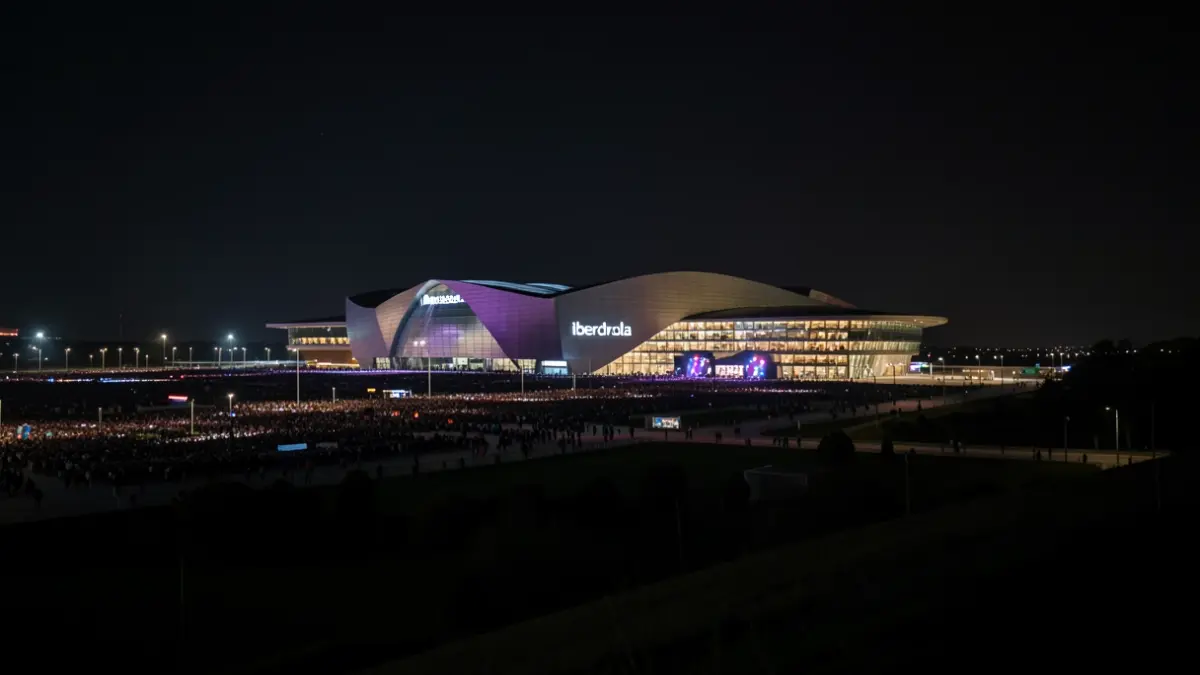 Generic image of the Iberdrola Music venue at night, with blurred lights and a sense of distant crowds.