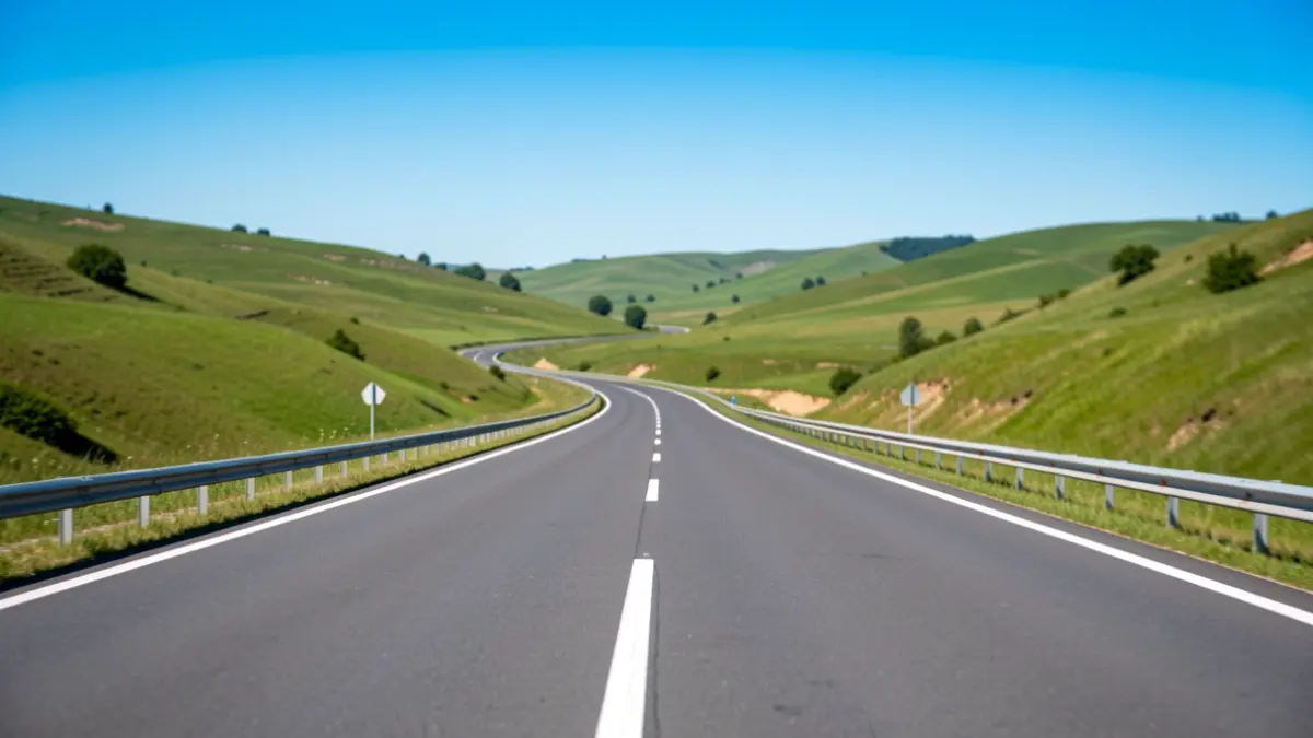 Generic image of a modern highway cutting through a green landscape in the Comunidad de Madrid.